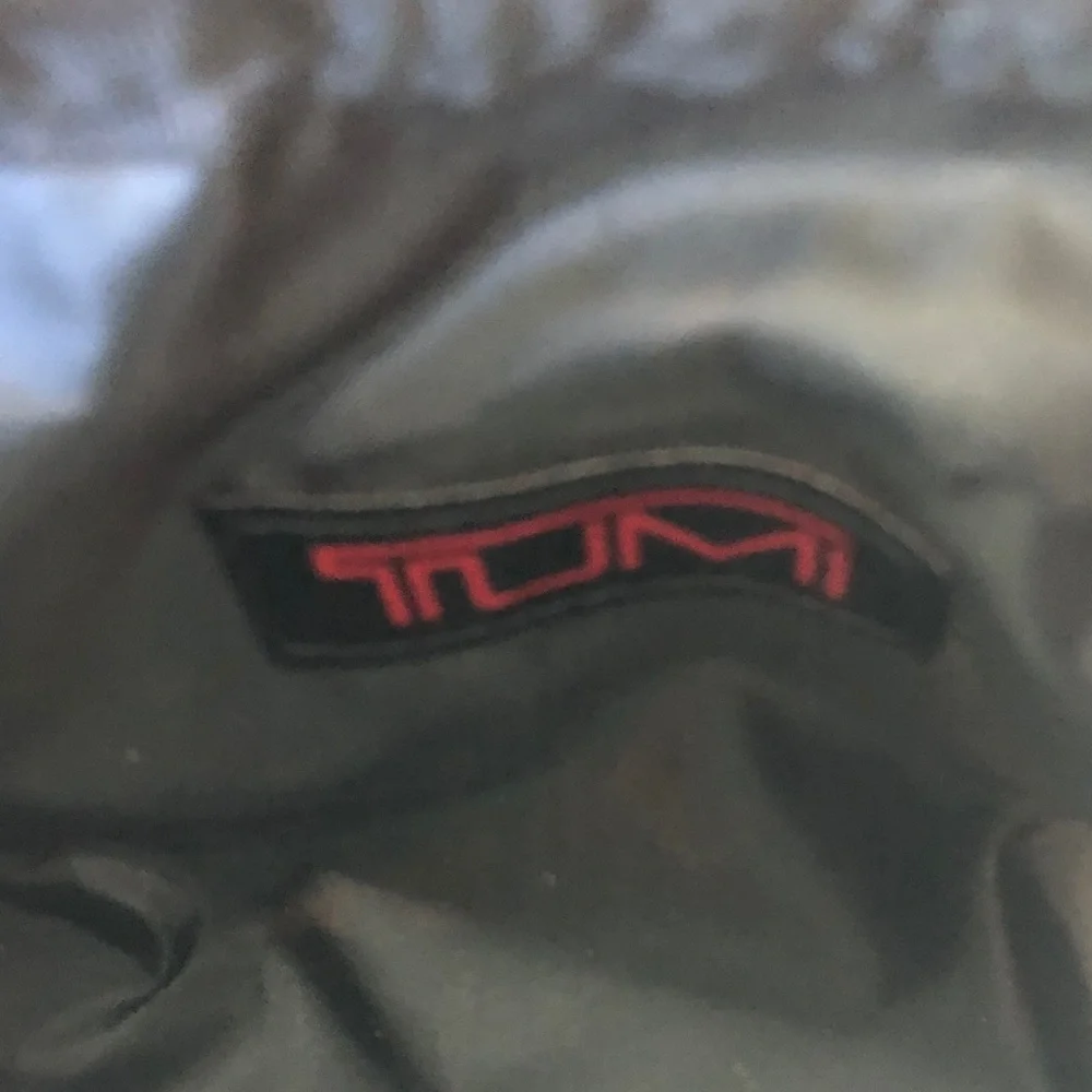 Tumi Black Textured Men's Toiletry Kit with Red Logo